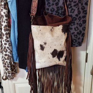Hair on hide fringed purse